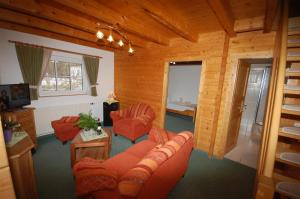 Posezení v ubytování Gaststätte und Pension Zum Klausner