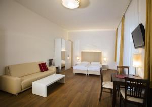 Postel nebo postele na pokoji v ubytování Apartment Nestroygasse