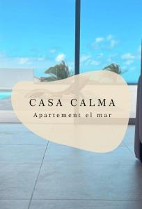 a sign that reads casa calma apartment chi mart at Casa Calma in Las Breñas
