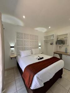 Ένα ή περισσότερα κρεβάτια σε δωμάτιο στο Seven on Cooper