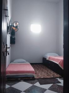 Postel nebo postele na pokoji v ubytování AN homestay2