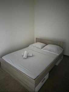 Ένα ή περισσότερα κρεβάτια σε δωμάτιο στο Beau T3