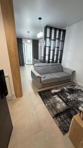 Et opholdsområde på Apartament vedere la mare Odyssey + 27 billeder