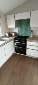 Køkken eller tekøkken på frankys presthaven retreat