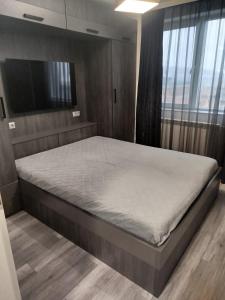 Ένα ή περισσότερα κρεβάτια σε δωμάτιο στο Apartment Diva