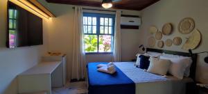 Ένα ή περισσότερα κρεβάτια σε δωμάτιο στο Hotel Pousada da Lagoa +71 φωτογραφίες