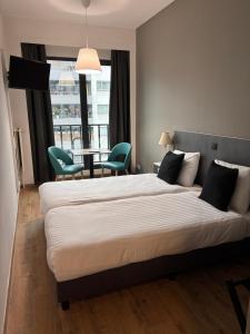 Voodi või voodid majutusasutuse Hotel Aviation toas