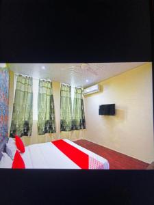 TV a/nebo společenská místnost v ubytování Hotel Platinum inn