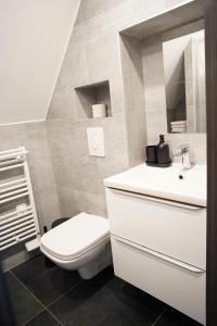 Koupelna v ubytování L'appartement de la fontaine