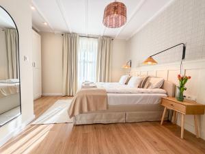 En eller flere senge i et værelse på Pod Karkonoskim Nurtem