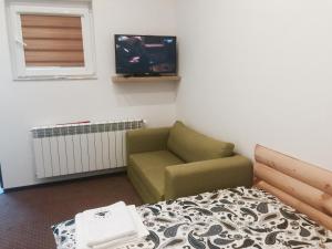 Telewizja i/lub zestaw kina domowego w obiekcie Agroturystyka Catranch
