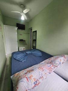 Ένα ή περισσότερα κρεβάτια σε δωμάτιο στο Pousada Maranata