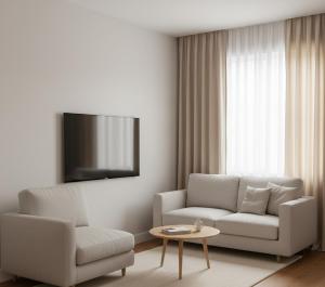 un soggiorno con un divano e una sedia di Cruzeiro Hotel Kaş a Kaş