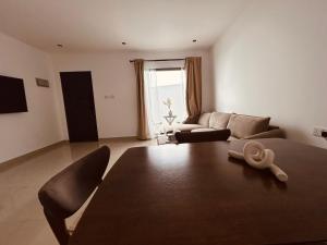 Χώρος καθιστικού στο Central Muscat Petit 1BR Villa