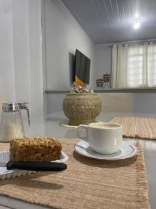 Μια τηλεόραση ή/και κέντρο ψυχαγωγίας στο Casa Aconchegante em São João Del Rei