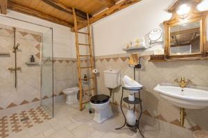 Koupelna v ubytování Agriturismo Bon Tajer