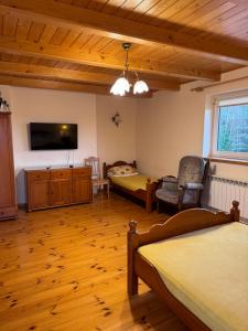 Μια τηλεόραση ή/και κέντρο ψυχαγωγίας στο Gospodarstwo Agroturystyczne nad jeziorem MM Piotrowscy