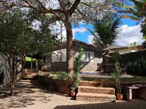 Zahrada ubytování Oásis Completo no Centro com Piscina e Escritório