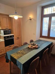 O bucătărie sau chicinetă la Appartamento 110mq Zona Terme posto auto privato