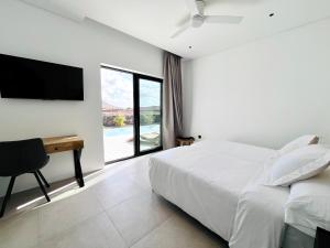 Ένα ή περισσότερα κρεβάτια σε δωμάτιο στο Villa la Guancha +10 φωτογραφίες