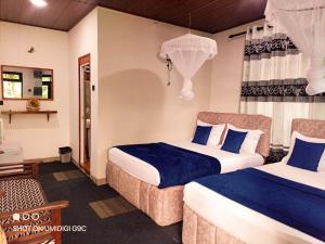 Ένα ή περισσότερα κρεβάτια σε δωμάτιο στο Summer Villa +33 φωτογραφίες