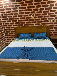 Ένα ή περισσότερα κρεβάτια σε δωμάτιο στο Residence Kuyito 2 Kahone