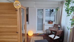 a small balcony with a table and a window at Apartment in Hattingen in Hattingen