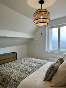 Ένα ή περισσότερα κρεβάτια σε δωμάτιο στο Les Chantereines