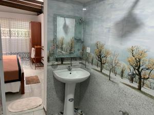 Koupelna v ubytování Turtle Residence