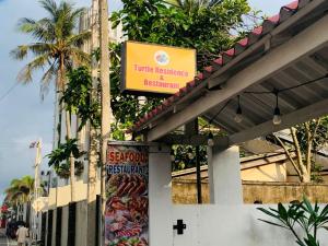 Certifikát, hodnocení, plakát nebo jiný dokument vystavený v ubytování Turtle Residence