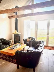 O zonă de relaxare la Modern Apartment On Historic Horse Farm