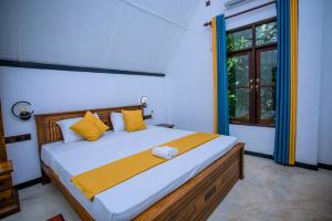 Ένα ή περισσότερα κρεβάτια σε δωμάτιο στο Sunny Hill Villa