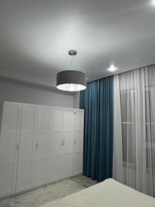 Postel nebo postele na pokoji v ubytování 24 home актау + 6 fotografií