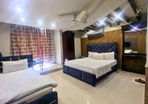 Postel nebo postele na pokoji v ubytování Quick continental Hotel - Jail Road + 54 fotografií