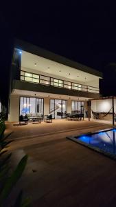 Swimmingpoolen hos eller tæt på Casa Mar dos Coqueirais