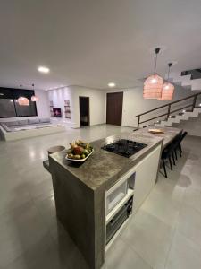 Køkken eller tekøkken på Casa Mar dos Coqueirais