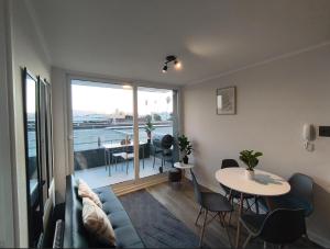 Χώρος καθιστικού στο Oceana Suites Edifcio HA