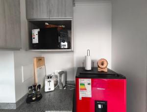 Η κουζίνα ή μικρή κουζίνα στο Oceana Suites Edifcio HA