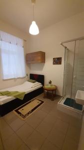 Ένα ή περισσότερα κρεβάτια σε δωμάτιο στο Hostel Elisabeth