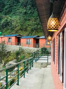 a light hanging from the side of a building at Mita Hotel-Resort Marga in Dhulikhel