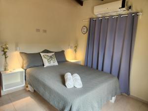 En eller flere senge i et værelse på Remanso 1