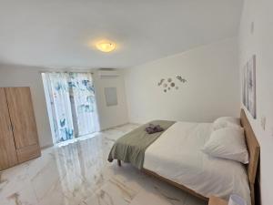 Ένα ή περισσότερα κρεβάτια σε δωμάτιο στο Il-Gawwija Suite Gozo