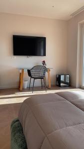 Μια τηλεόραση ή/και κέντρο ψυχαγωγίας στο 50 Passi dal Duomo +5 φωτογραφίες