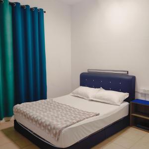 Postel nebo postele na pokoji v ubytování Serene Homestay