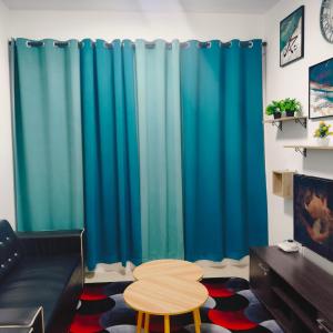 TV a/nebo společenská místnost v ubytování Serene Homestay