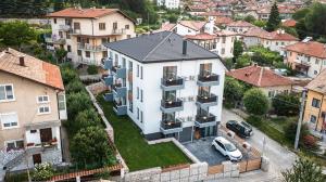 an aerial view of a building in a city at TheHouse - Apartment Kamenitza in Velingrad