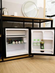 Kuchyň nebo kuchyňský kout v ubytování MK Two Hotel