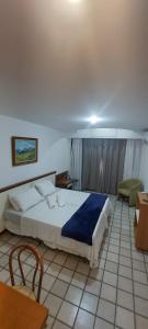 Giường trong phòng chung tại Pasargada flat