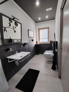 Ένα μπάνιο στο Villa Mariana Bed and Breakfast