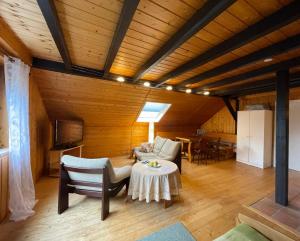 a living room with a couch and a table at Bunnyhill in Elchingen